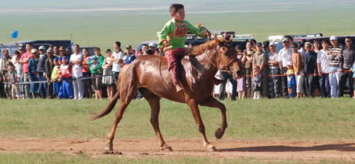 Mongolia kid riding